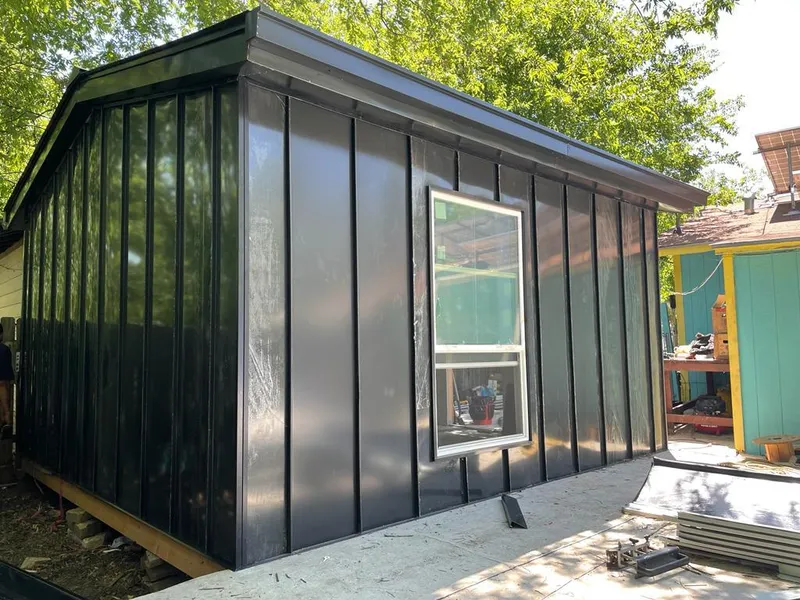 Black standing seam metal wall panels for Roof Inspection in Shorewood